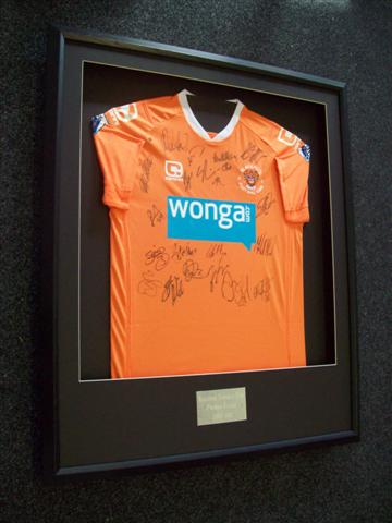 SHIRTFRAMING PICTURE FRAMING CENTRE.jpg