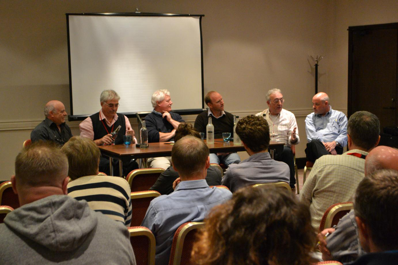 Kevin (Ashworth &amp; Thompson), Mal Reynolds, Mark Wallington, Mark Wilson (Framiac), John Turner (Roboframer), and Steve Goodall (Wessex) discussing who is buying the first round